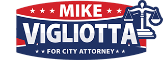 Campaign logo reading ‘MIKE VIGLIOTTA’ with ‘FOR CITY ATTORNEY’ below, in a red, white, and blue banner with white stars and a scales-of-justice icon on the right.